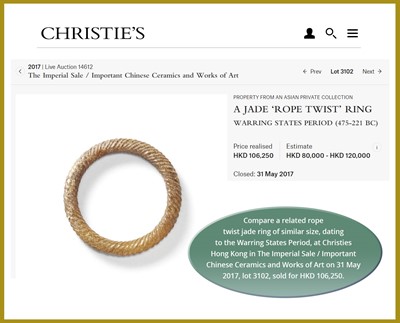 Lot 251 - A CELADON AND RUSSET JADE ROPE-TWIST RING