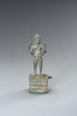 Lot 1299 - A KHMER BRONZE FIGURE OF VISHNU, ANGKOR PERIOD