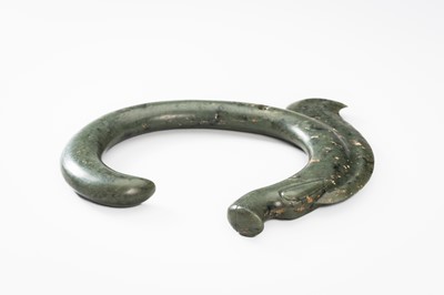 A LARGE GREEN JADE ‘C-SHAPED DRAGON' PENDANT, HONGSHAN CULTURE