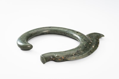 A LARGE GREEN JADE ‘C-SHAPED DRAGON' PENDANT, HONGSHAN CULTURE