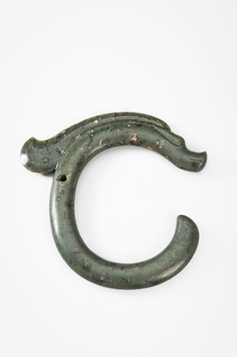 A LARGE GREEN JADE ‘C-SHAPED DRAGON' PENDANT, HONGSHAN CULTURE