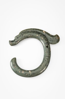 A LARGE GREEN JADE ‘C-SHAPED DRAGON' PENDANT, HONGSHAN CULTURE
