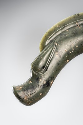 A LARGE GREEN JADE ‘C-SHAPED DRAGON' PENDANT, HONGSHAN CULTURE