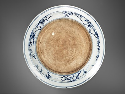 Lot 420 - A MONUMENTAL BLUE AND WHITE ‘LANDSCAPE’ CHARGER, KANGXI PERIOD