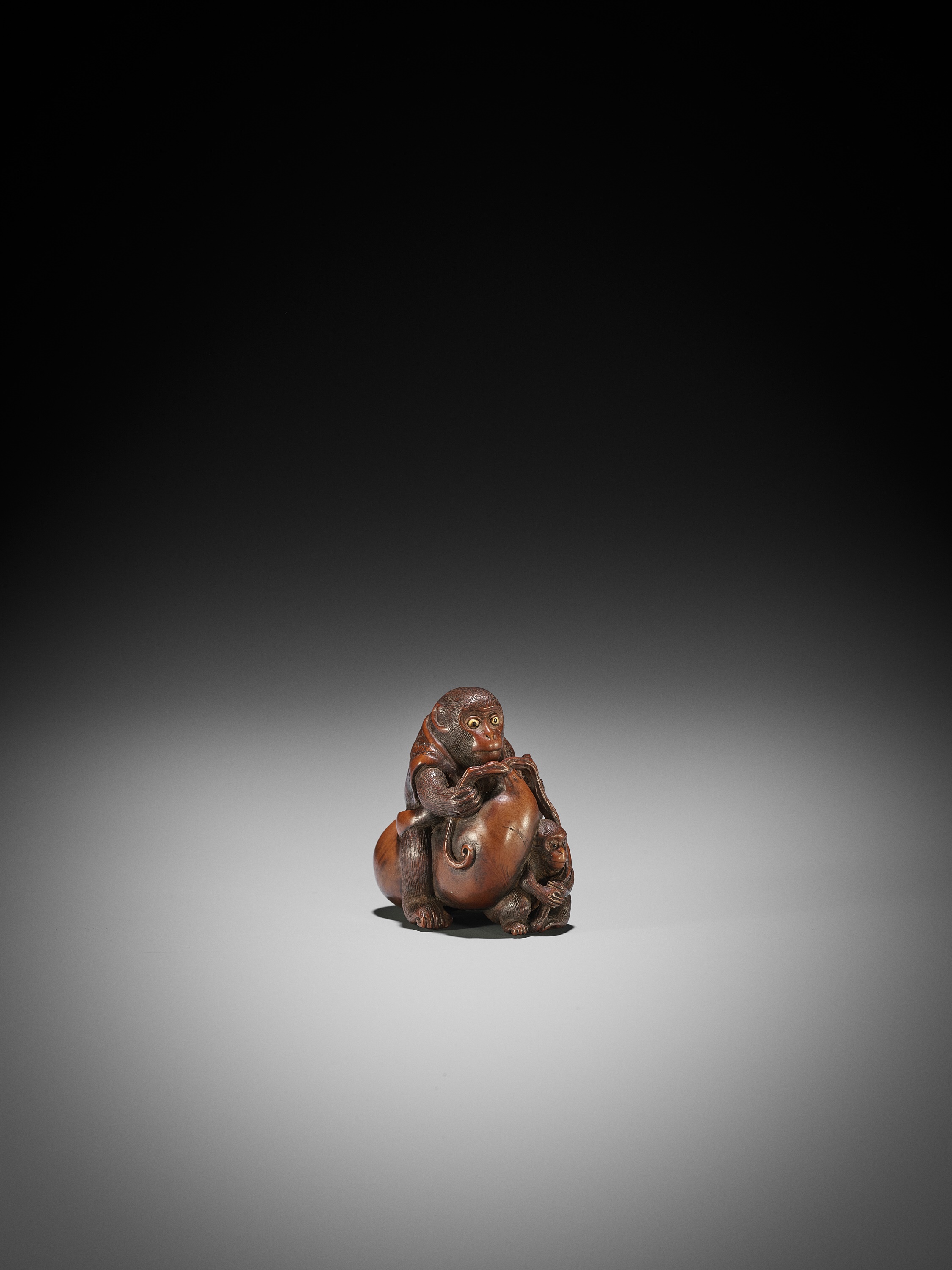 Lot 204 - MASACHIKA: A FINE WOOD NETSUKE OF MONKEY