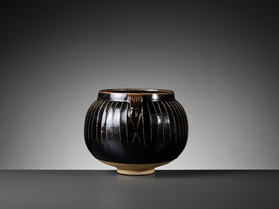 Lot 471 - A BLACK-GLAZED RIBBED JAR, NORTHERN SONG TO JIN DYNASTY