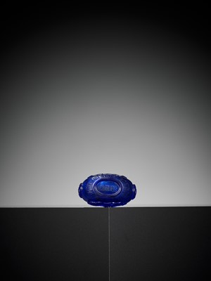 Lot 134 - A BLUE GLASS ‘MALLOW’ SNUFF BOTTLE, QIANLONG MARK AND PERIOD