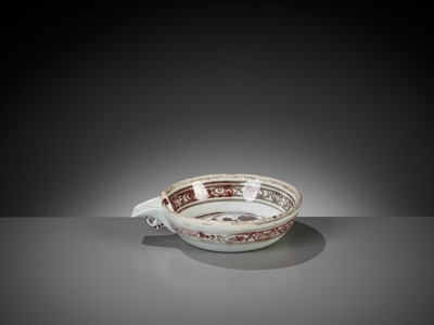Lot 483 - A RARE UNDERGLAZE-RED POURING BOWL, YI, YUAN TO MING DYNASTY