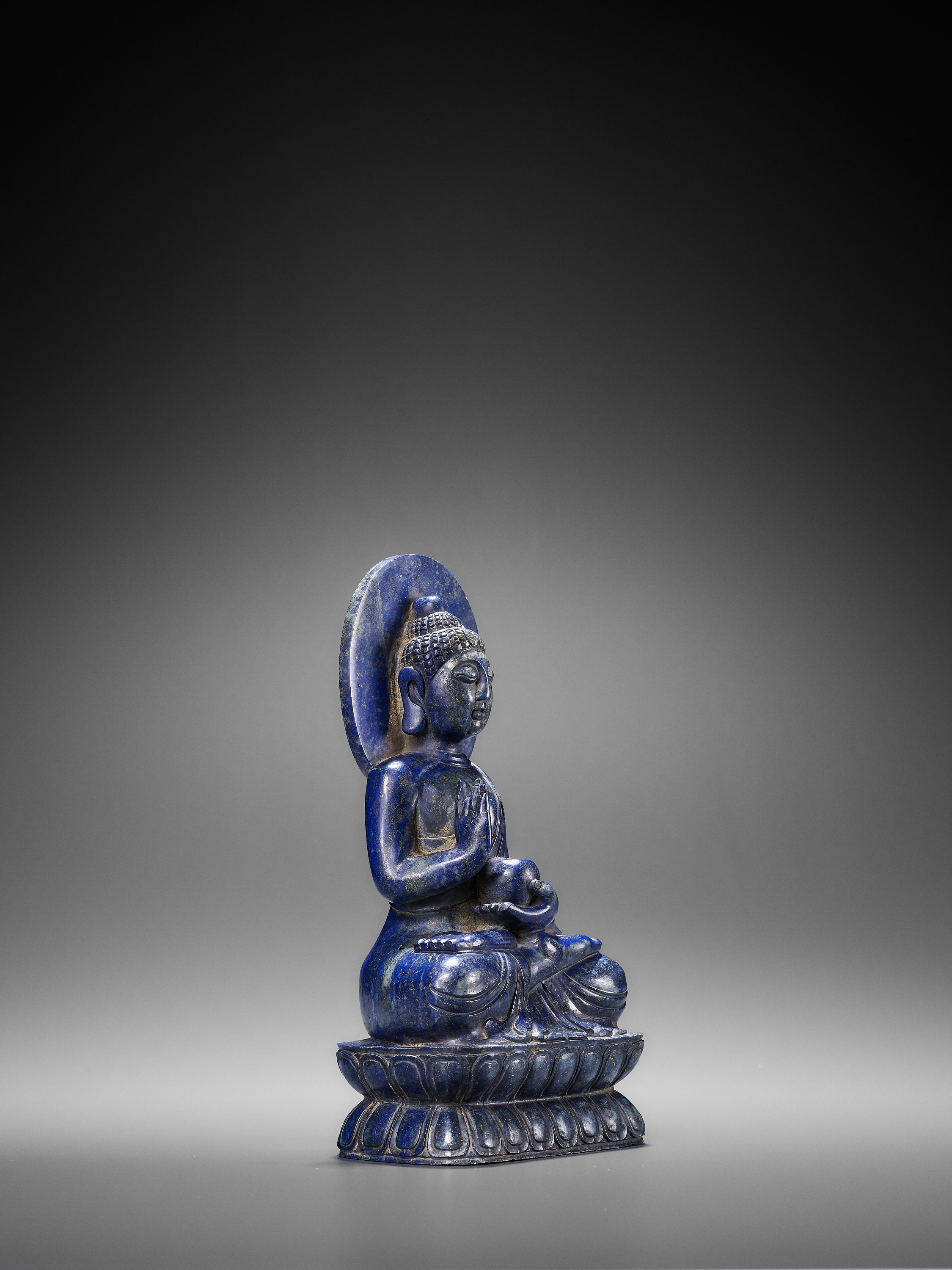 A small black limestone figure of a lion, Tang dynasty | 唐