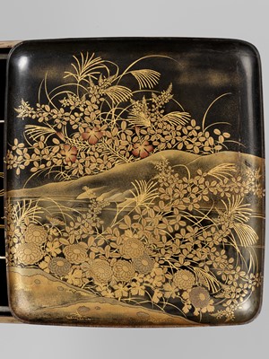 Lot 265 - A BLACK AND GOLD LACQUER SUZURIBAKO WITH CHRYSANTHEMUM AND DUCKS