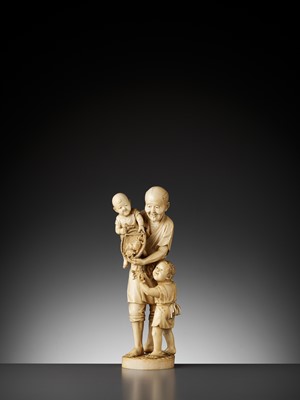 Lot 644 - A LARGE AND IMPRESSIVE IVORY OKIMONO OF A FAMILY FISHING FOR TURTLES