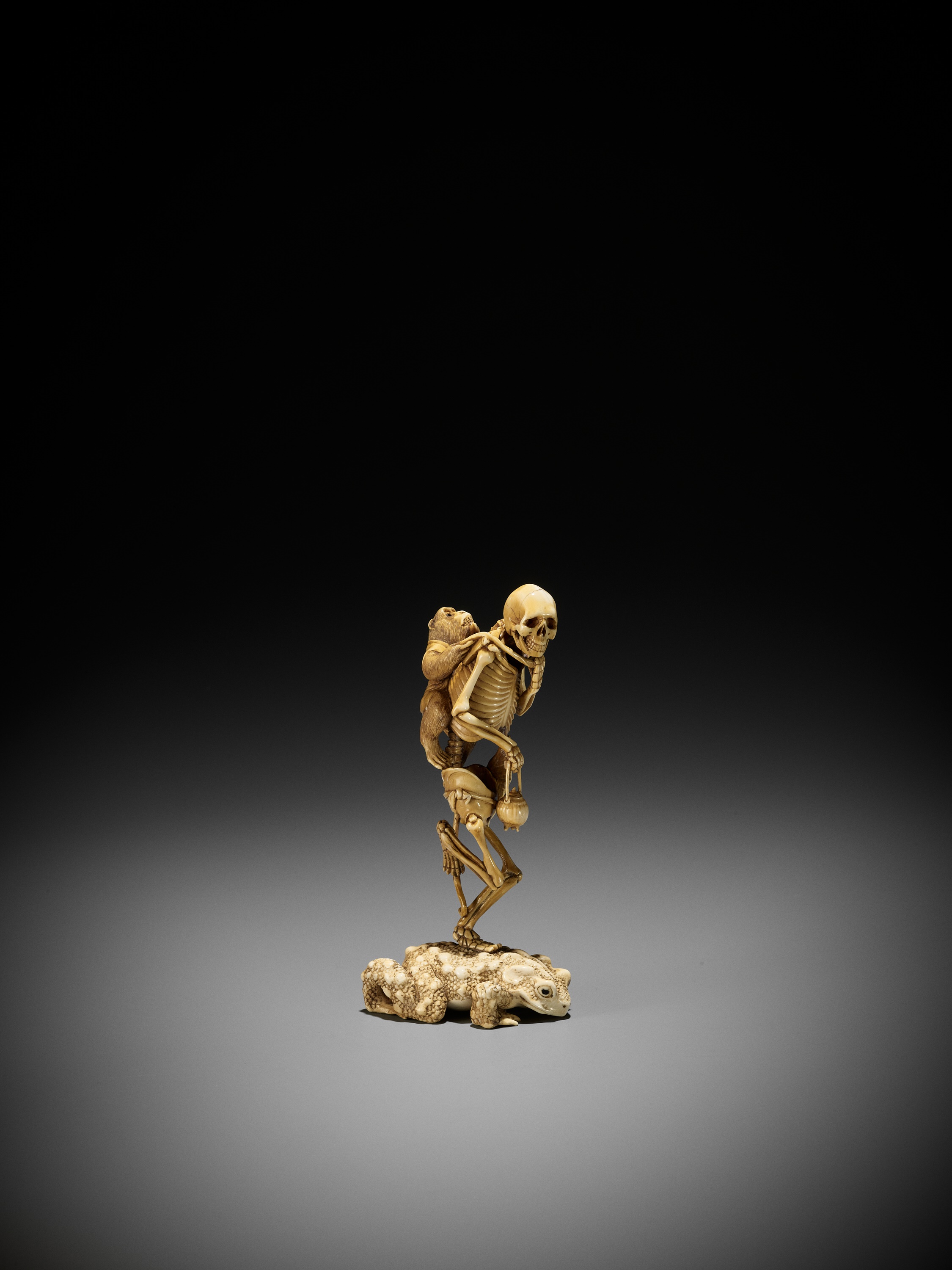 Lot 200 - ASAHI GYOKUZAN: A SUPERB IVORY OKIMONO OF A