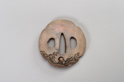 Lot 678 - A COPPER TSUBA WITH OCTOPUS AND WAVES