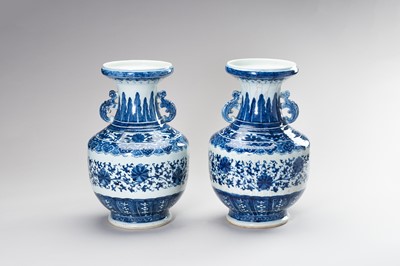 Lot 895 - A LARGE PAIR OF BLUE AND WHITE PORCELAIN BALUSTER VASES