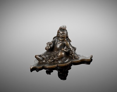 Lot 11 - A FIGURAL BRONZE SCROLL WEIGHT, MING DYNASTY