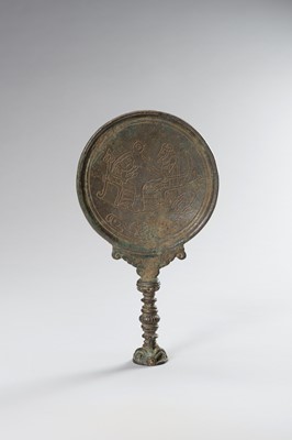 Lot 1286 - A GANDHARAN BRONZE MIRROR WITH A FIGURAL SCENE