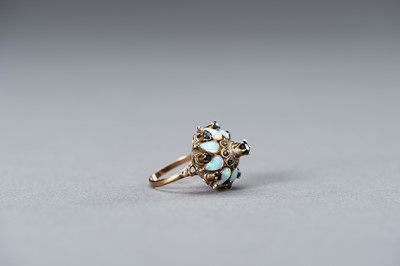 Lot 1382 - AN OPAL-SET OTTOMAN STYLE GOLD RING