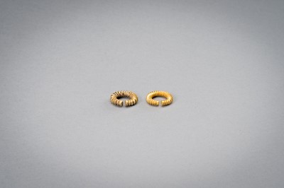 Lot 1156 - A PAIR OF EARLY CAMBODIAN RIBBED GOLD EARRINGS