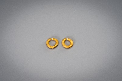 Lot 1155 - A PAIR OF EARLY CAMBODIAN RIBBED GOLD EARRINGS