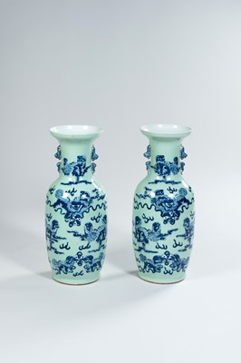 Lot 842 - A CELADON, BLUE AND WHITE PAIR OF BALUSTER VASES