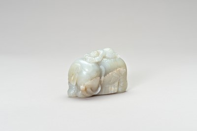 Lot 276 - A PALE CELADON JADE CARVING OF AN ELEPHANT AND BOY