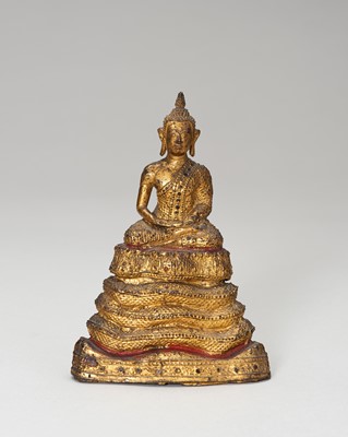 Lot 815 - A SMALL LACQUER GILT BRONZE FIGURE OF A SEATED BUDDHA
