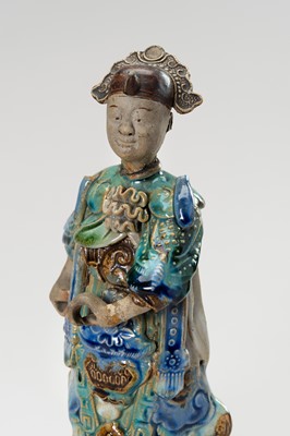 Lot 793 - A PAIR OF GLAZED SHIWAN POTTERY FIGURES