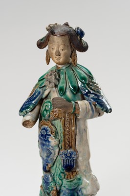 Lot 793 - A PAIR OF GLAZED SHIWAN POTTERY FIGURES