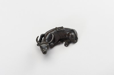 Lot 27 - A CHINESE BRONZE FIGURE OF A TAMED WATER BUFFALO