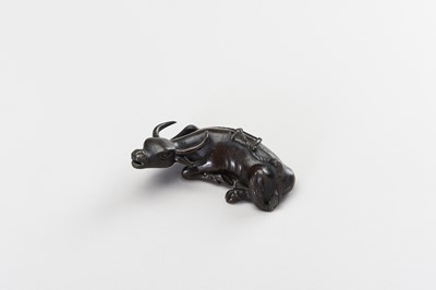 Lot 27 - A CHINESE BRONZE FIGURE OF A TAMED WATER BUFFALO