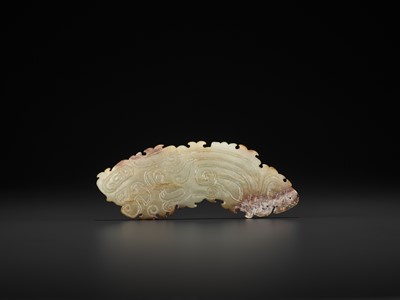 A WHITE AND RUSSET JADE ORNAMENT, WESTERN ZHOU