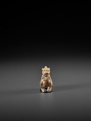 Lot 107 - A JADE CARVING OF A BIXIE, SIX DYNASTIES