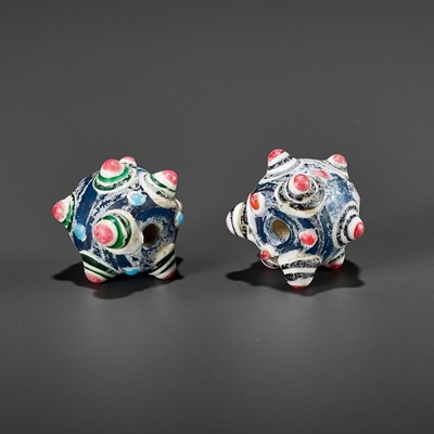 Lot 746 - A PAIR OF GLASS BEADS, HAN DYNASTY