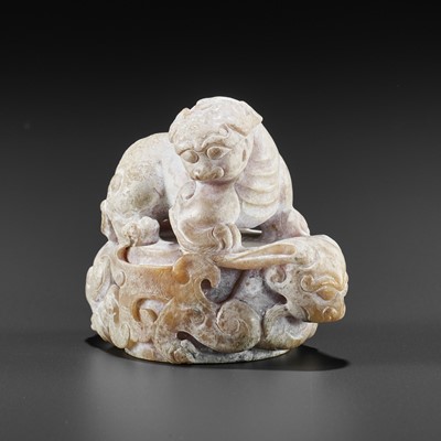 Lot 845 - A JADE CARVING OF A CHILONG AND LION, HAN – SIX DYNASTIES