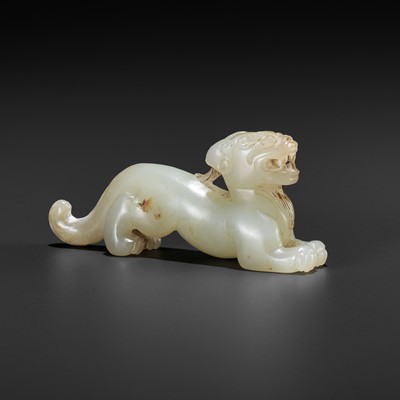 Lot 861 - A JADE FIGURE OF A TIGER, QING OR EARLIER