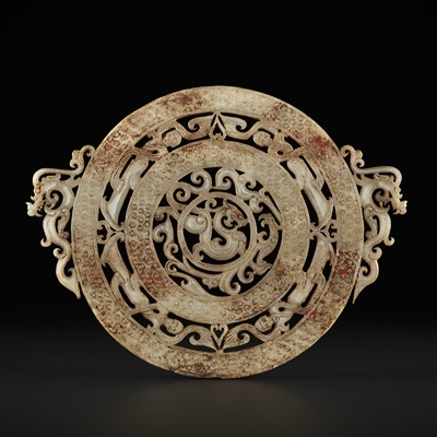 Lot 934 - A LARGE OPENWORK JADE BI DISC WITH DRAGONS, PHOENIXES AND CELESTIAL FIGURES, HAN DYNASTY