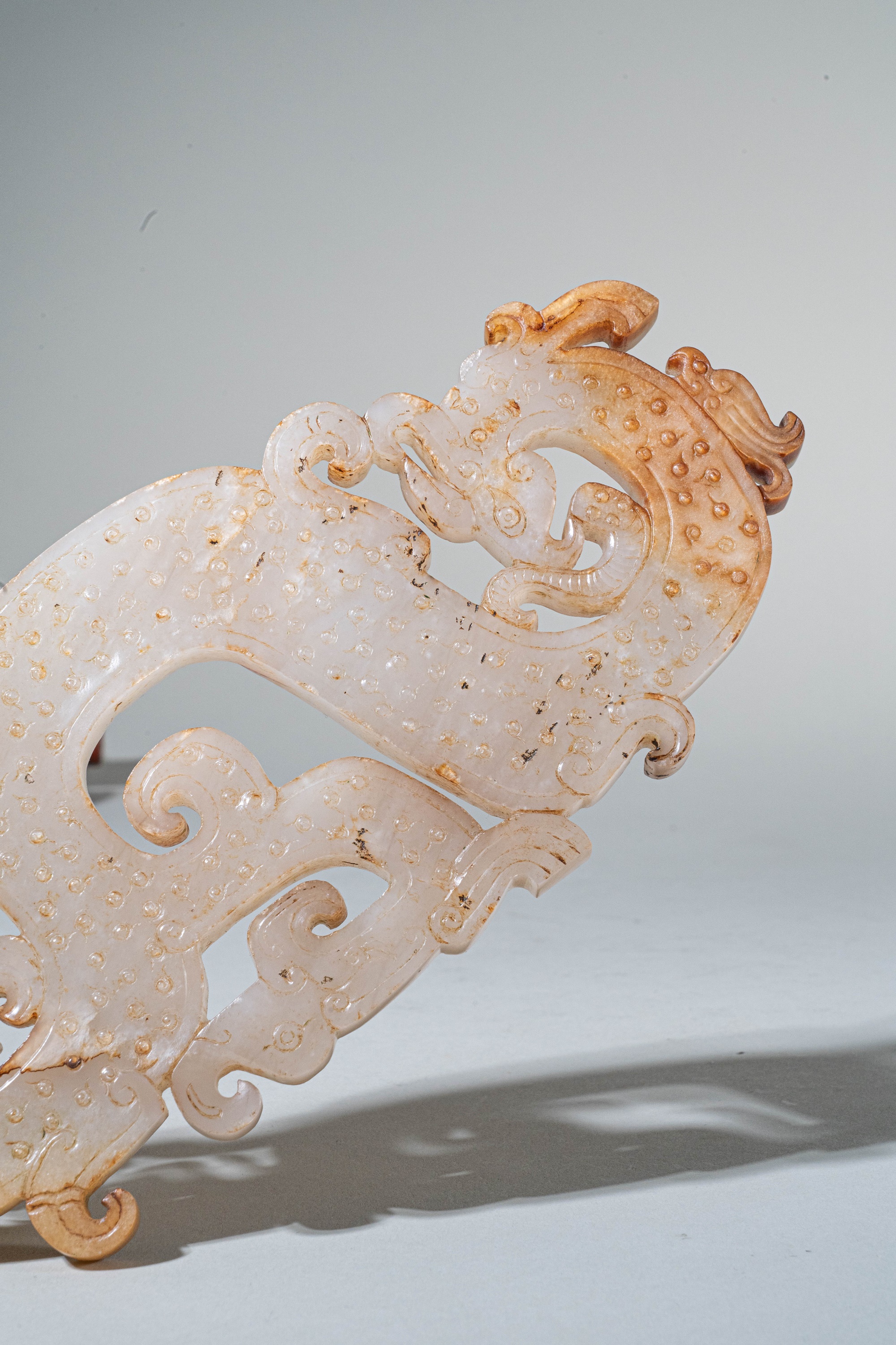 Lot 71 - A LARGE AND IMPORTANT WHITE JADE 'DRAGON AND