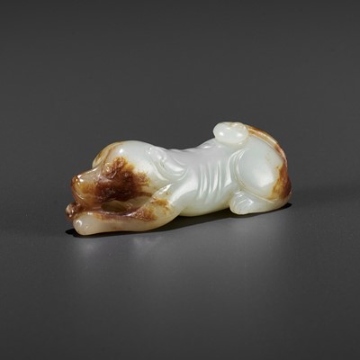 Lot 860 - A JADE FIGURE OF A HOUND, QING OR EARLIER